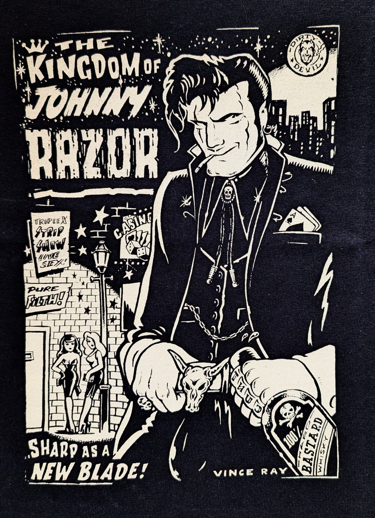 A black and white graphic print featuring an illustrated portrait of Vincent Vega from The Kingdom of Johnny Razor, holding a knife, with stylized text and comic-book scene elements.